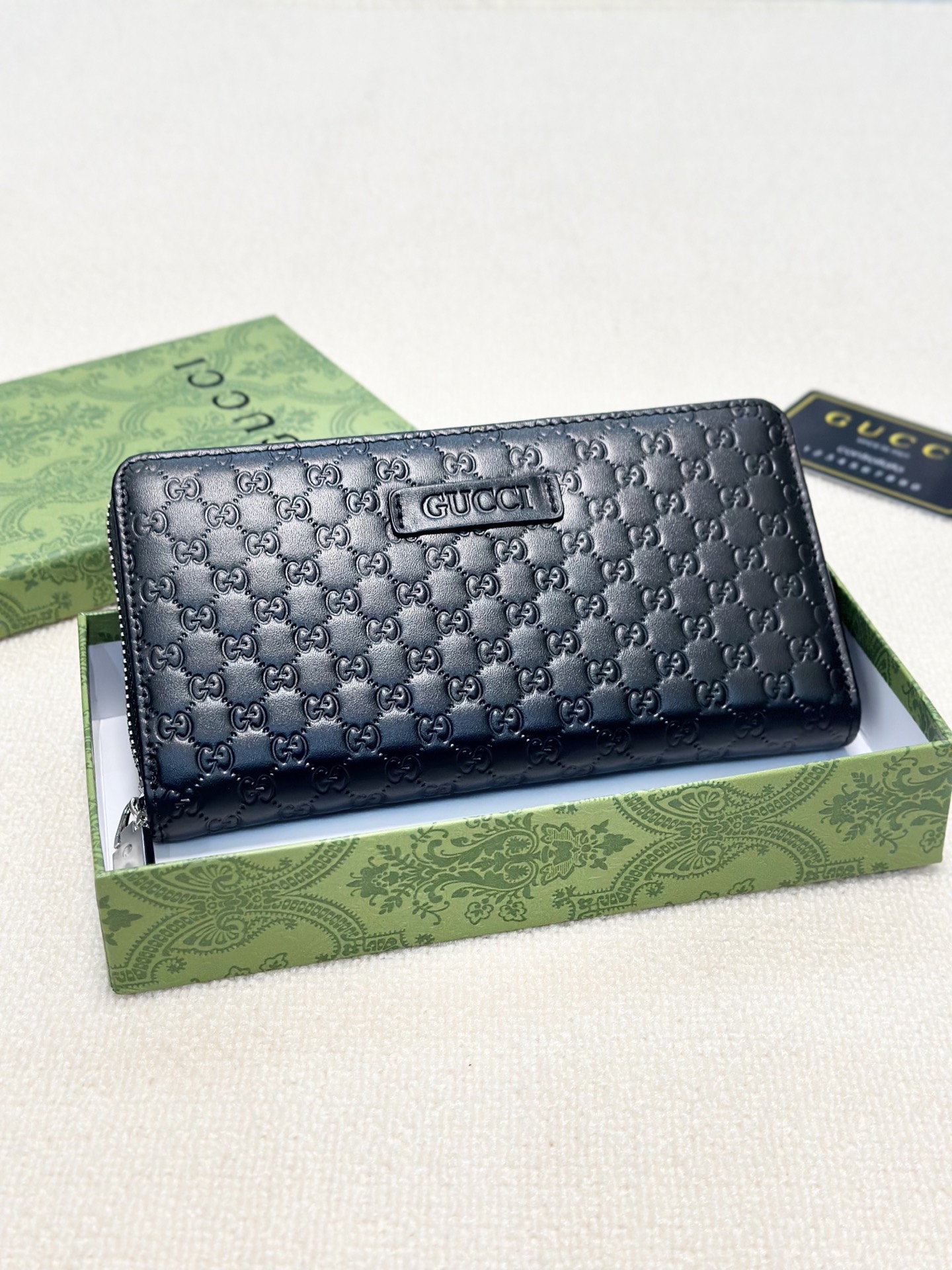 GUCCI グッチ 長財布 ロングジップ 押し込みロゴ ブラック