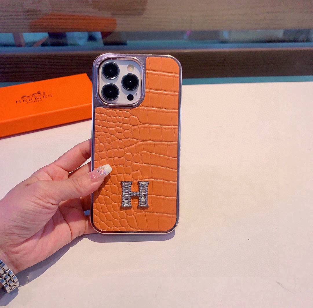HERMES 愛馬仕 iPhone 18シリーズ対応 iPhoneケース スマホケース 全機種対応 レディース ロゴ入り カーフレザー調 オレンジ - 画像 2