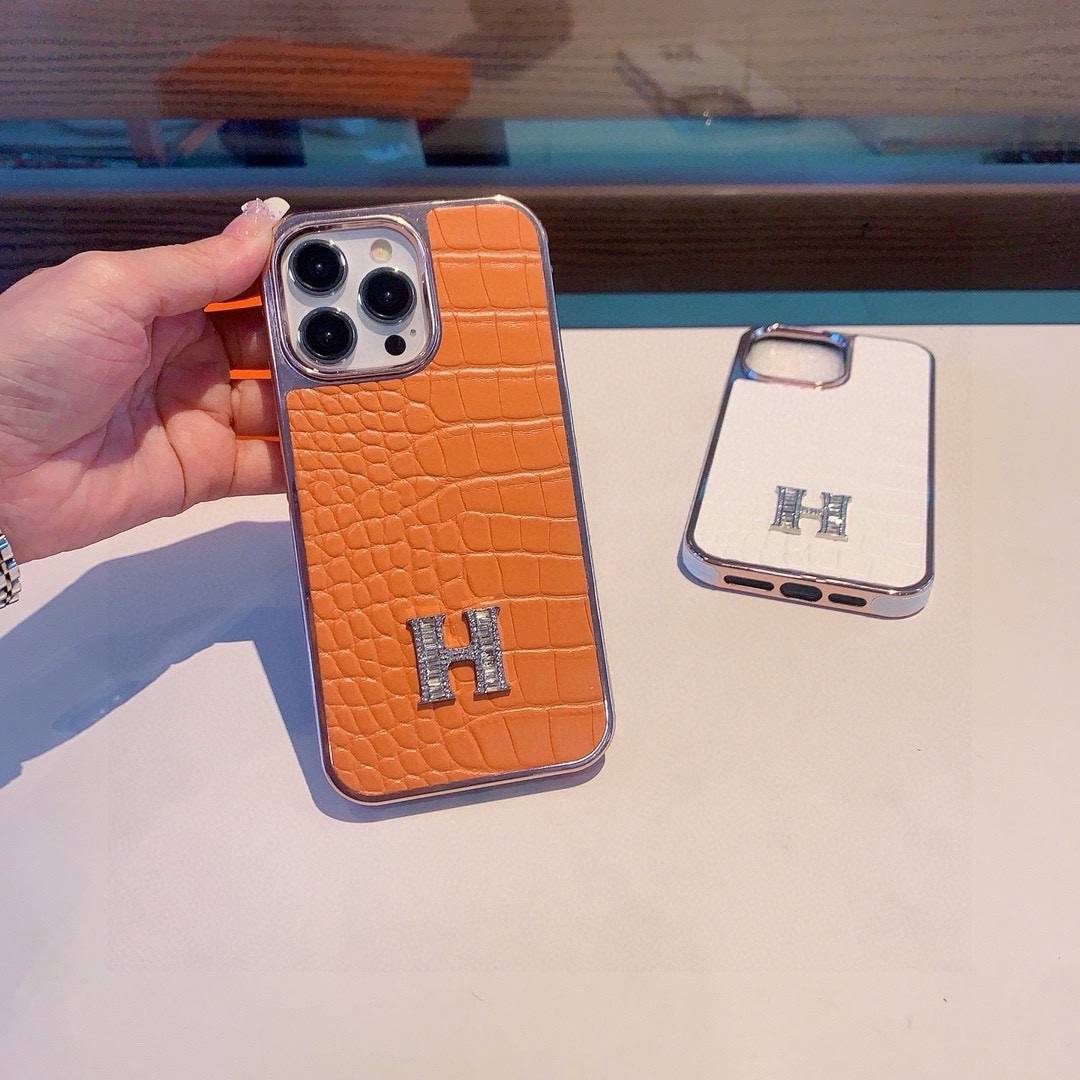 HERMES 愛馬仕 iPhone 18シリーズ対応 iPhoneケース スマホケース 全機種対応 レディース ロゴ入り カーフレザー調 オレンジ - 画像 3