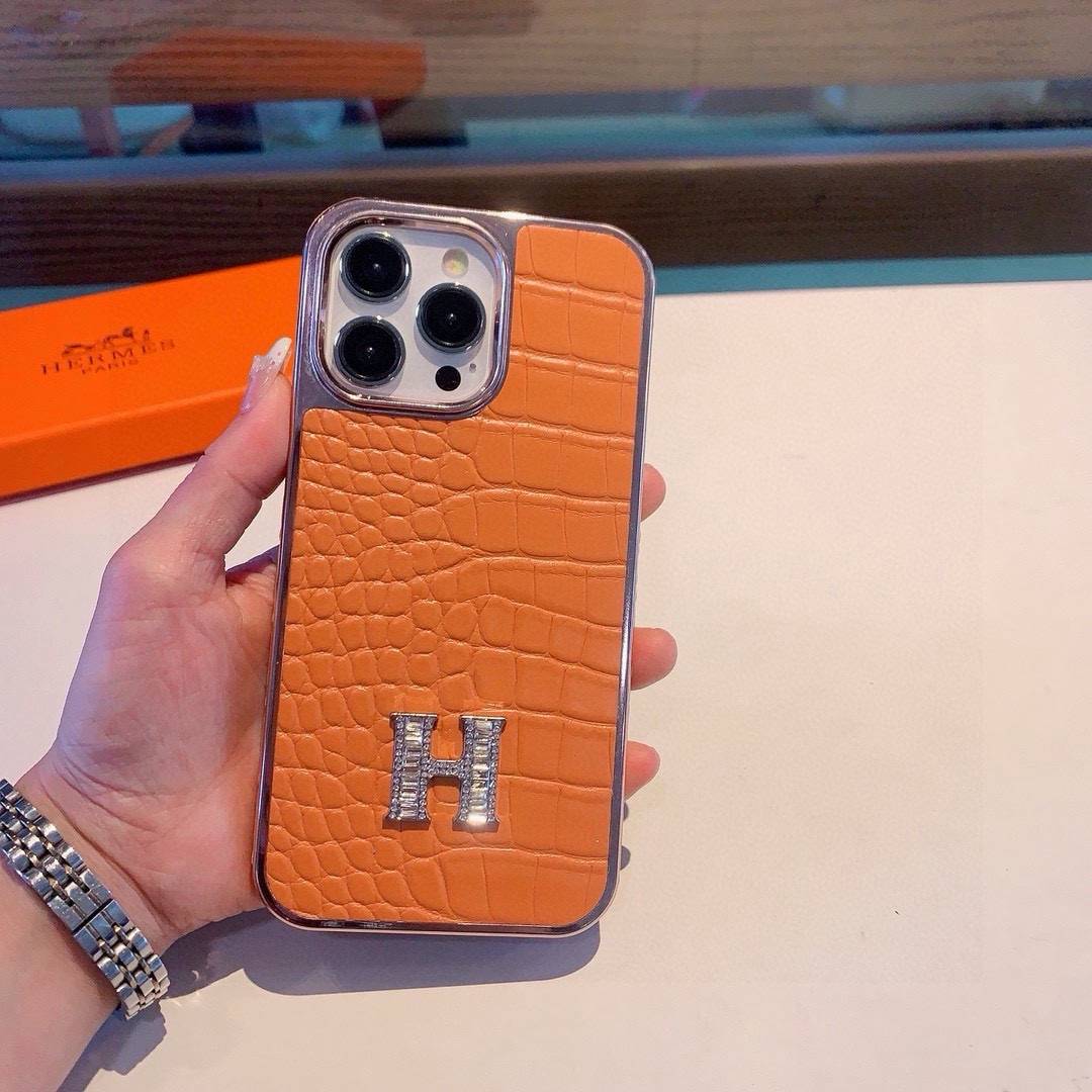 HERMES 愛馬仕 iPhone 18シリーズ対応 iPhoneケース スマホケース 全機種対応 レディース ロゴ入り カーフレザー調 オレンジ - 画像 4