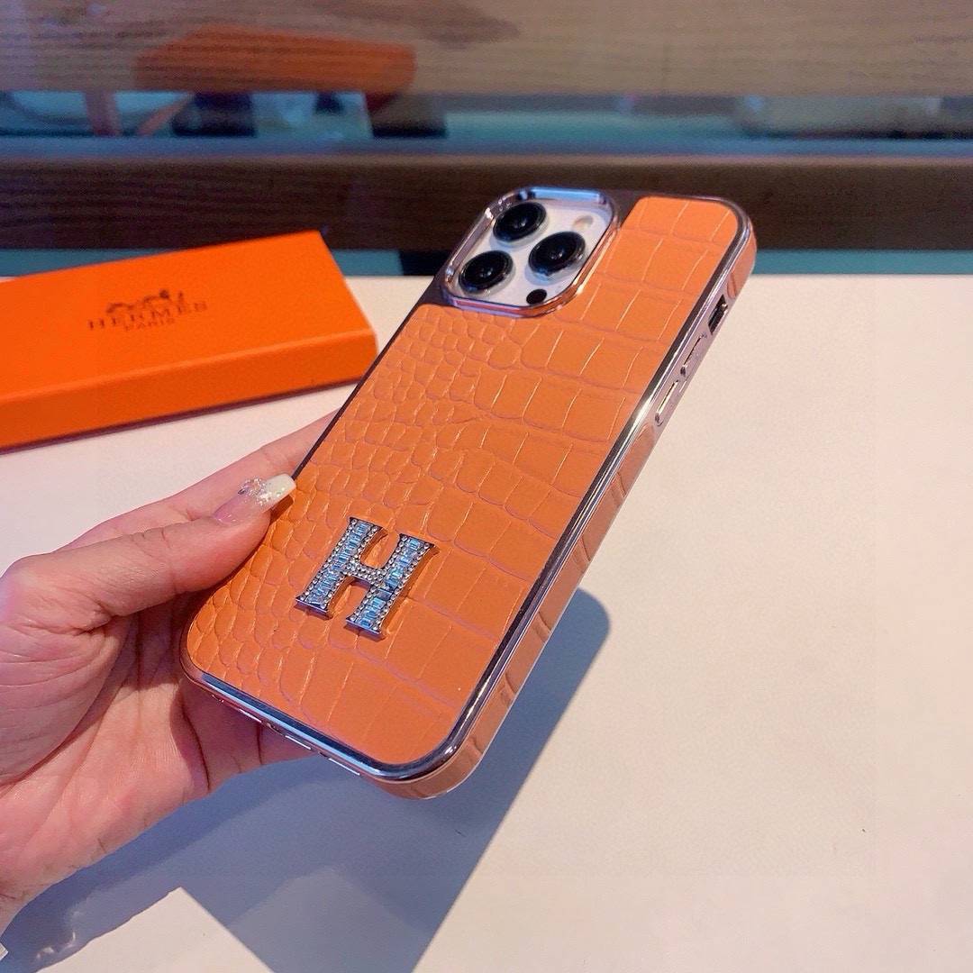 HERMES 愛馬仕 iPhone 18シリーズ対応 iPhoneケース スマホケース 全機種対応 レディース ロゴ入り カーフレザー調 オレンジ - 画像 6