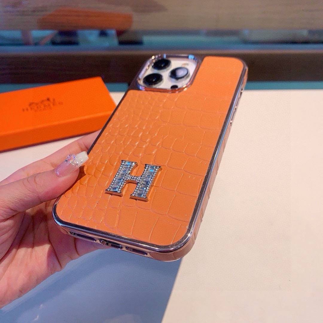 HERMES 愛馬仕 iPhone 18シリーズ対応 iPhoneケース スマホケース 全機種対応 レディース ロゴ入り カーフレザー調 オレンジ - 画像 8