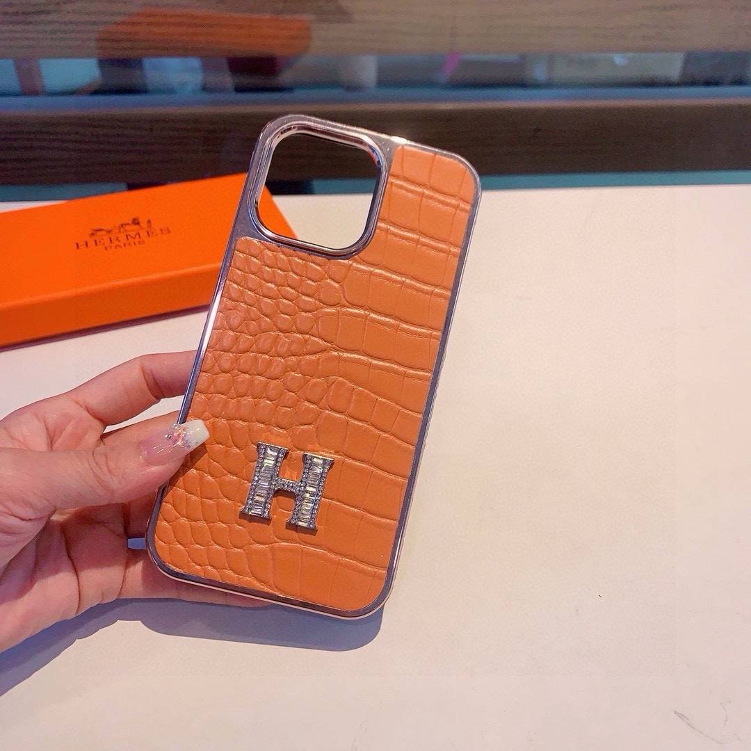 HERMES 愛馬仕 iPhone 18シリーズ対応 iPhoneケース スマホケース 全機種対応 レディース ロゴ入り カーフレザー調 オレンジ - 画像 9