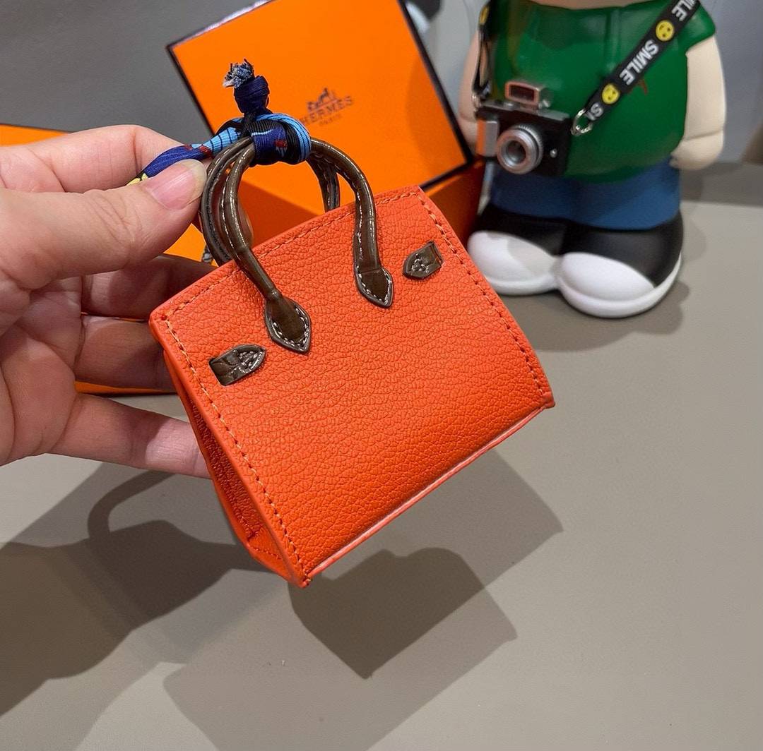 Hermes ヘルメス iPhone 18シリーズ対応 iPhoneケース スマホケース レディース ミニポーチ ブルゾン ロゴ入り - 画像 7