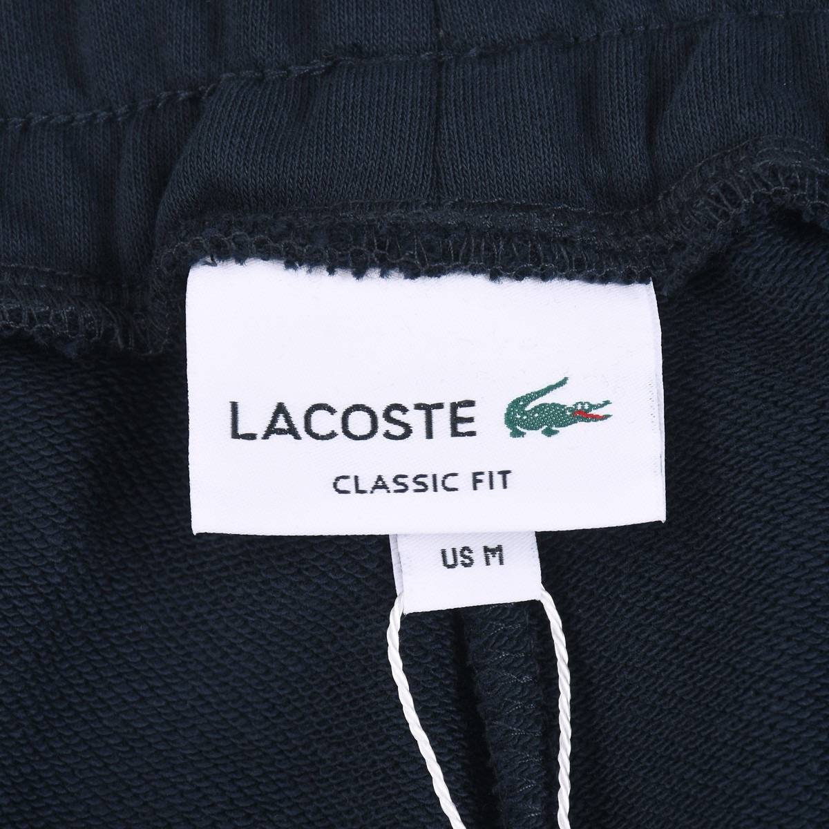 LACOSTE メンズ イージーパンツ ボトムス ジョガーパンツ サイドライン ロゴ刺繍 ロングコード ブラック - 画像 5