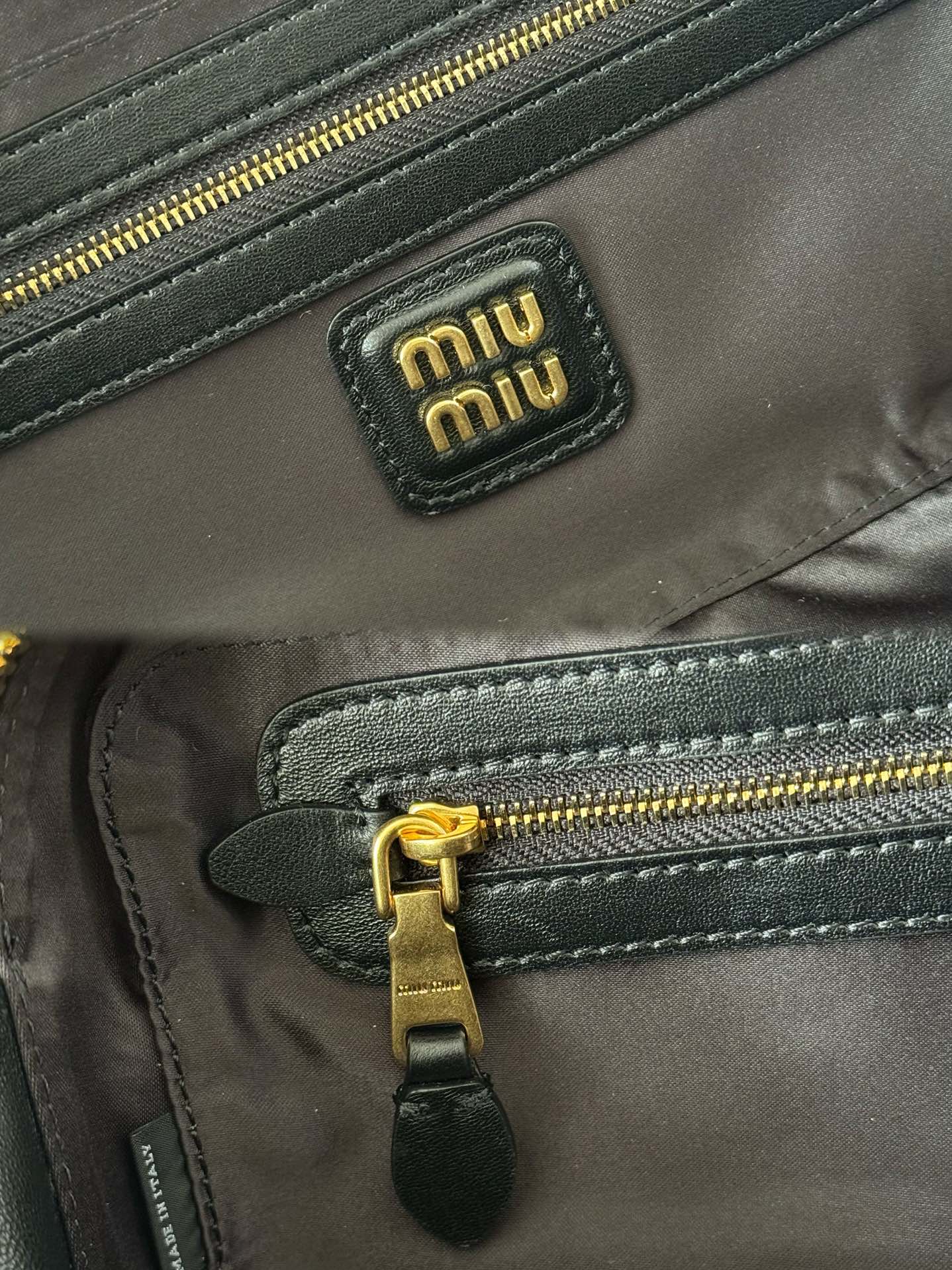 Miu Miu ミュウミュ レザー キャリーバッグ ブラック|コンパクト・軽量・収納力 - 画像 9